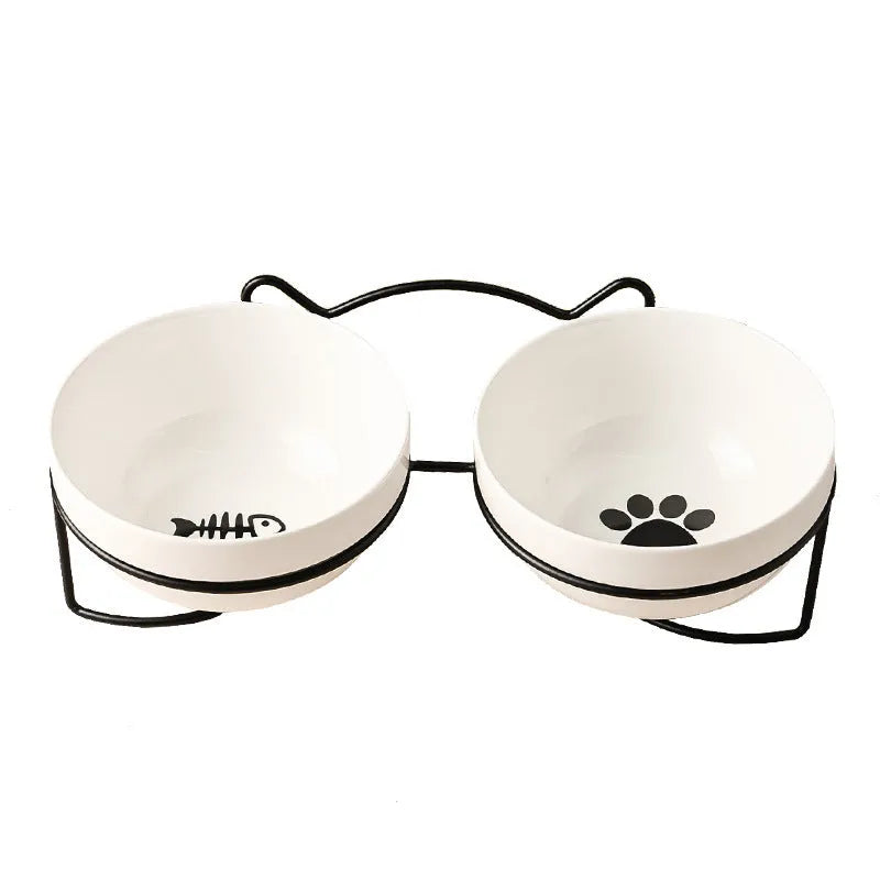 White ceramic pet bowl with decorative pattern in iron frame with cat ear accents