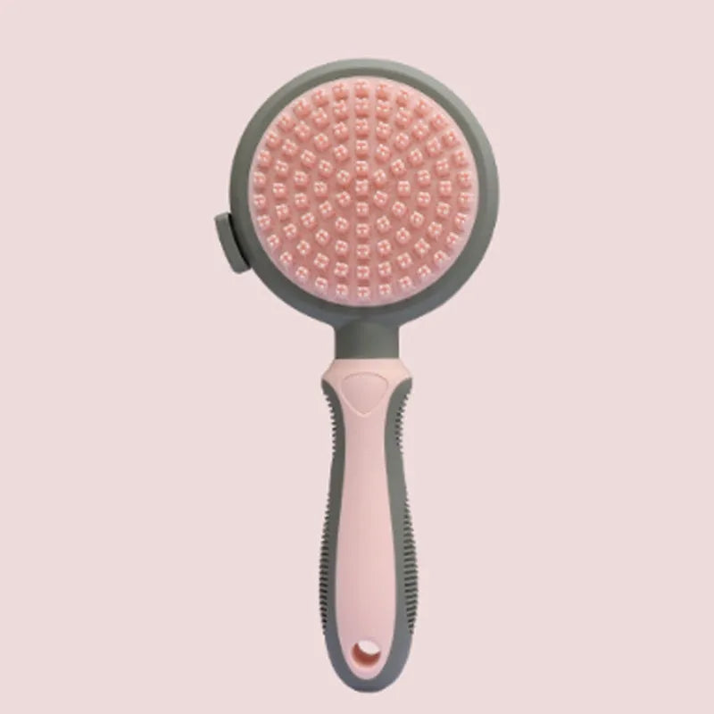 Green and pink dual-sided pet grooming brush with retractable slicker brush and silicone massager pins