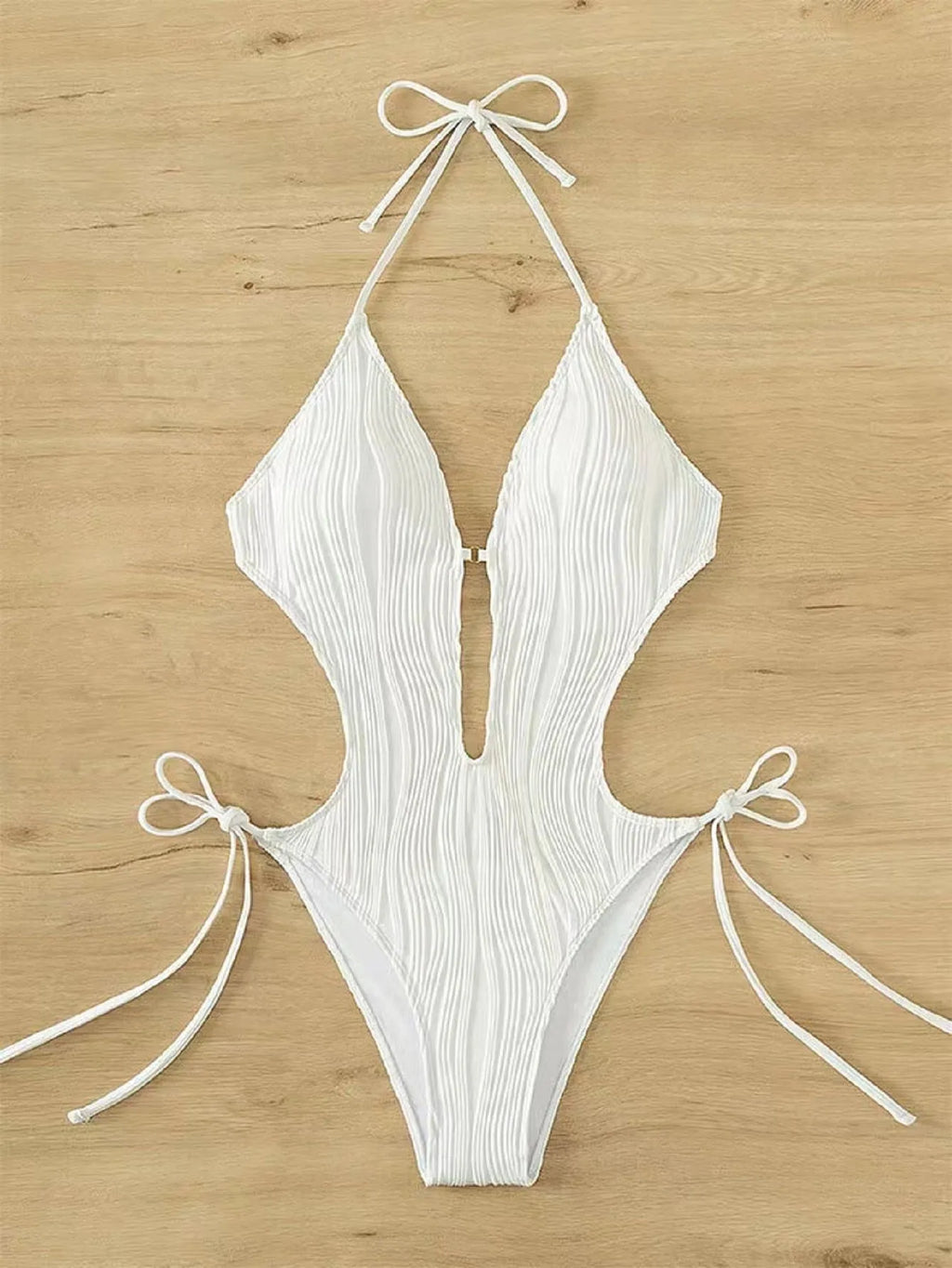 Women's black triangle bikini with front lace-up detail and matching bottoms