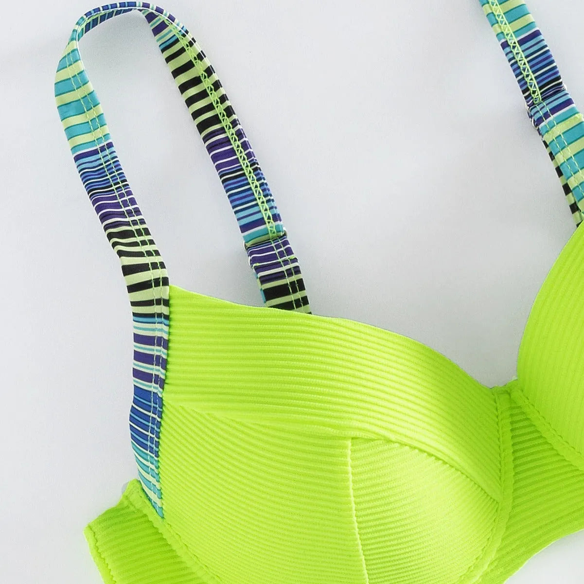 Green printed women's halter bikini set with brief-style bottom and split design
