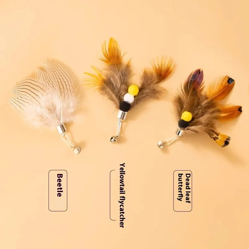 Three steel wire cat toy replacement heads with flying insect designs in distinct colour combinations