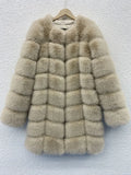 Women's thick artificial fur coat in apricot colour with regular sleeves
