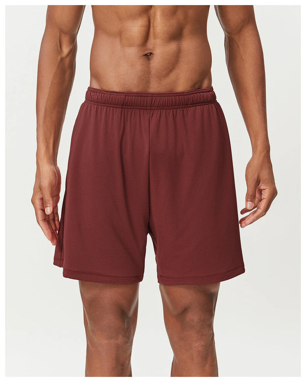 Men's double-layer quick-drying running shorts in brick red colour on a mid-waist model.