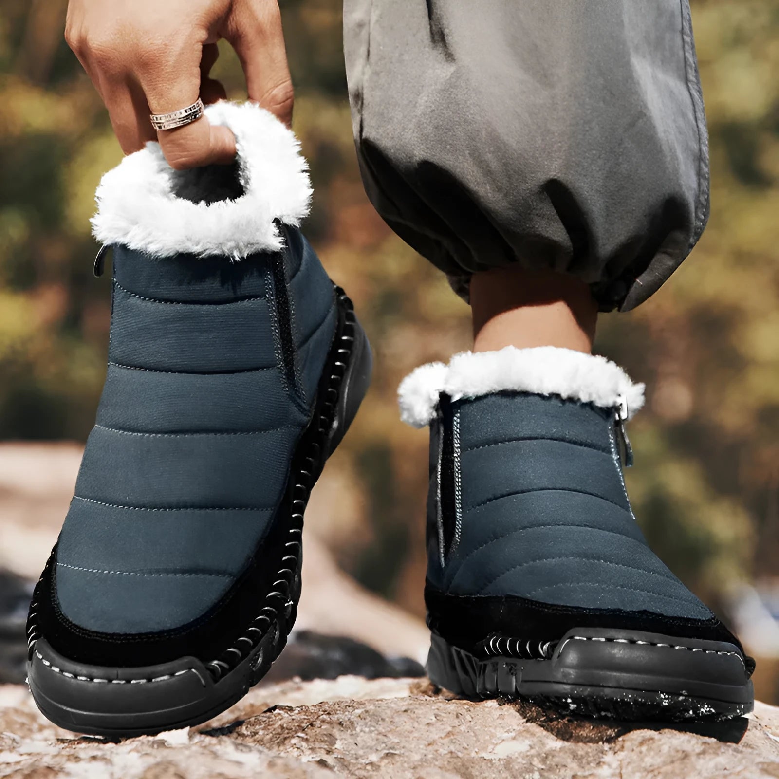 Men's plus size snow boot in black with round toe, flat heel, and non-slip rubber sole.