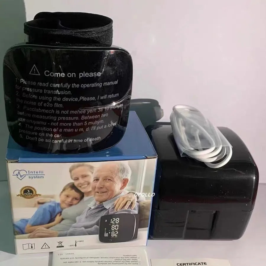 Black wrist blood pressure monitor with digital LCD screen and USB charging port