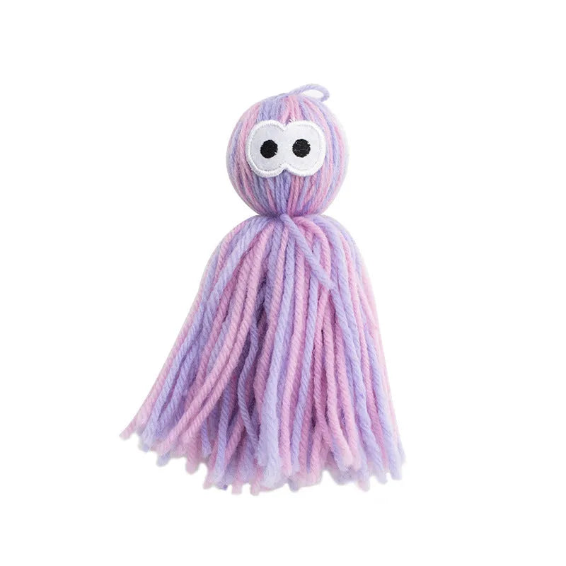 Wool cat toy ball with hanging loop in blue grey colour, dimensions 10x13x4cm