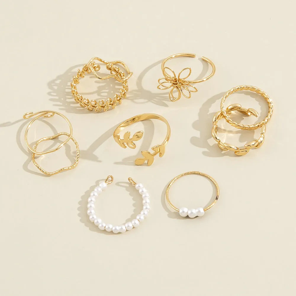Women's openwork flower ring in electroplated alloy with gold J0656 colour and glossy finish