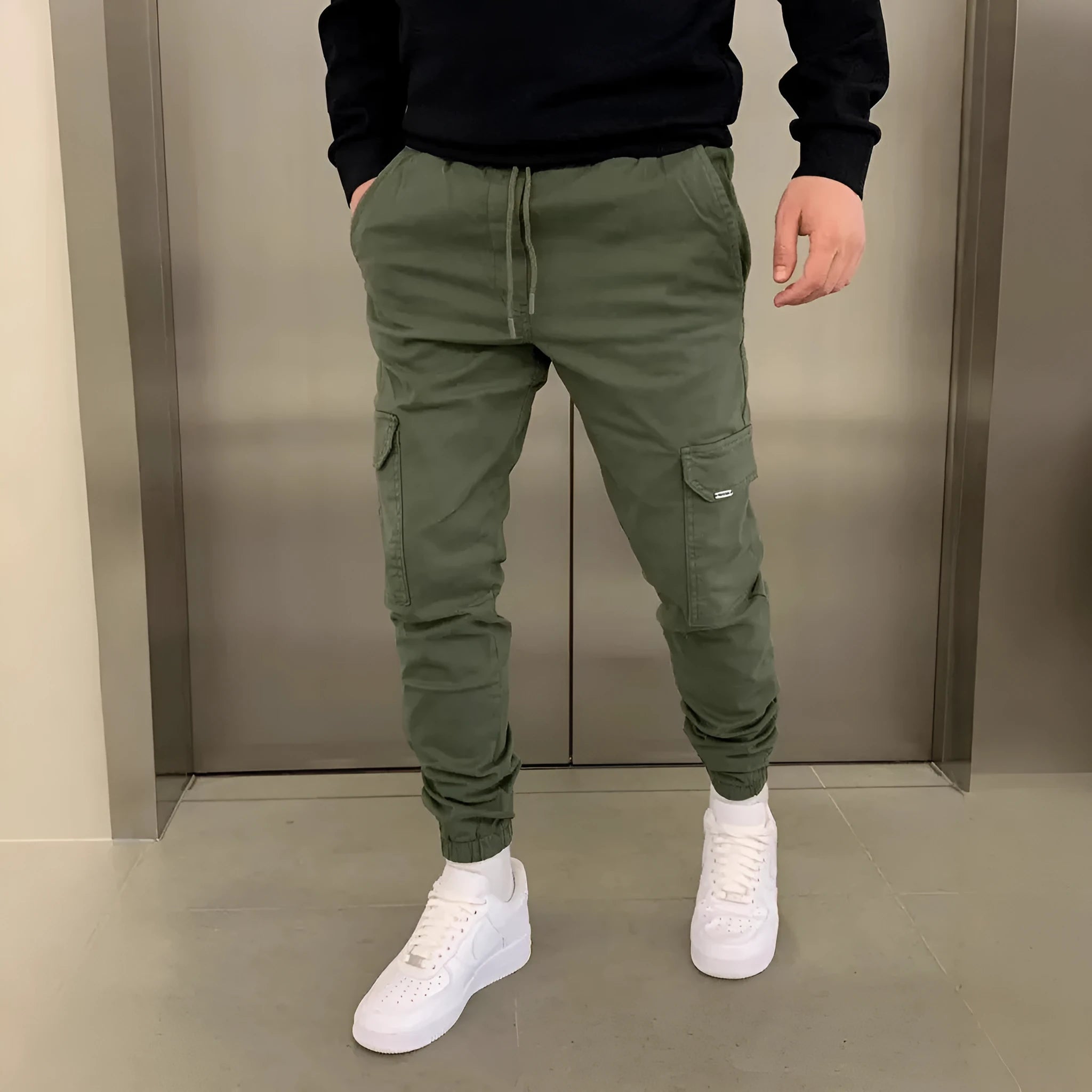 Men's polyester overalls with dimensional patch pockets and elastic waistband in straight leg baggy pants style