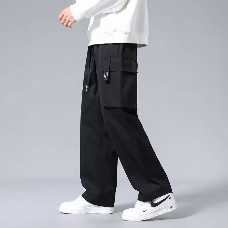 Boys' straight leg cargo trousers with drawstring waist and large pockets in polyester fabric