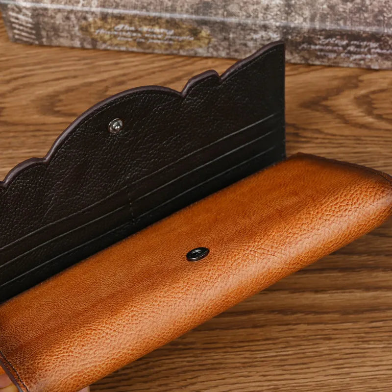 Chinese floral embossed tri-fold women's wallet in retro brown cowhide leather showing folded dimensions