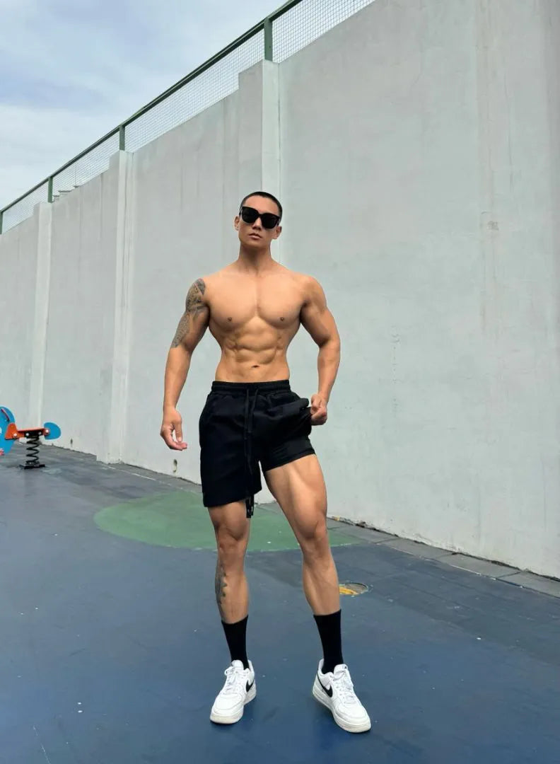 Men's ice silk quick-drying double-layer casual shorts in nylon fabric on a colour swatch background.