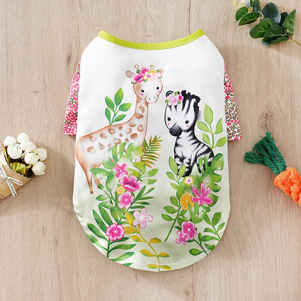 Printed polyester t-shirt for a small dog on a white background, showing colour and design.