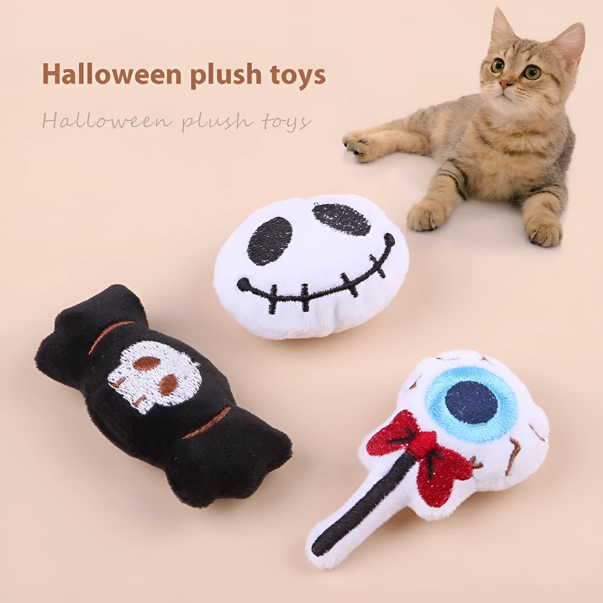 Small cat teaser wand with a soft plush head in eyes, candy, or skull design