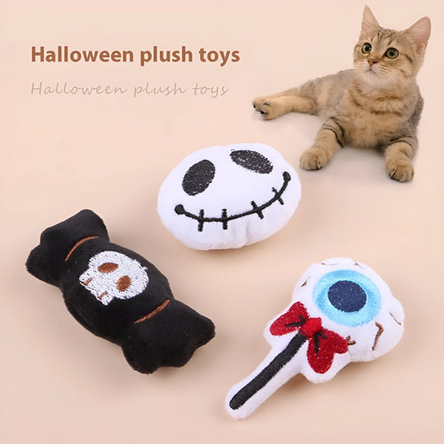 Small cat teaser wand with a soft plush head in eyes, candy, or skull design