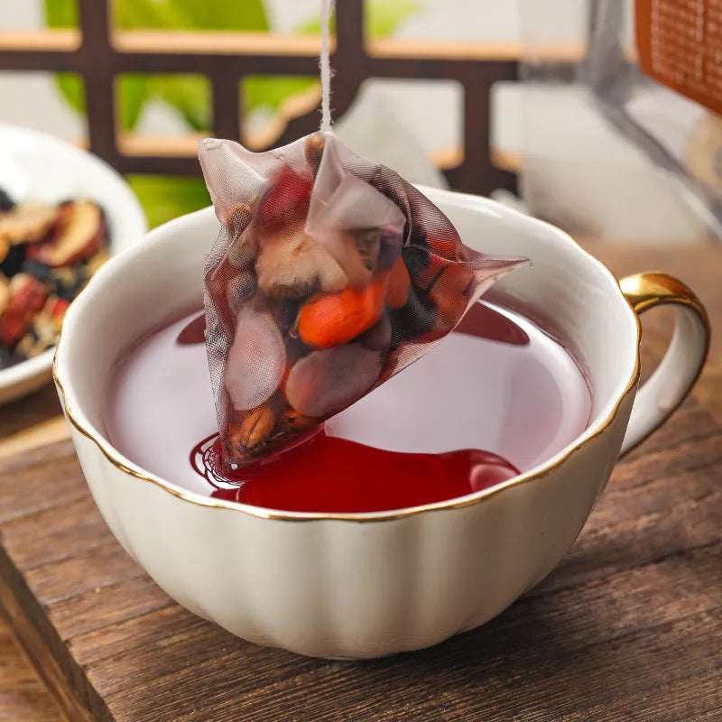 Box of Ginseng Mulberry Black Wolfberry Tea showing 40 individual 5g sachets totaling 200g.