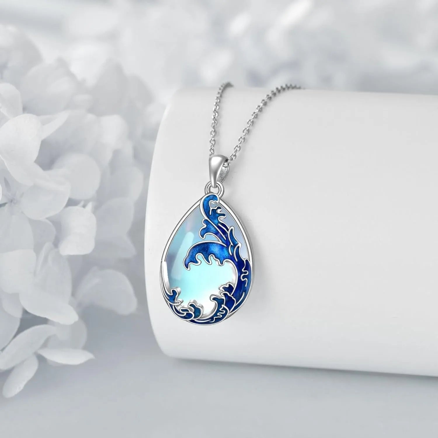 Moonstone blue alloy heart pendant necklace for women on a silver-toned chain.