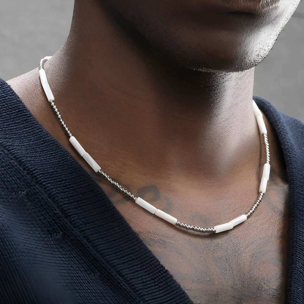White shell and silver steel bead handmade collarbone chain necklace on display