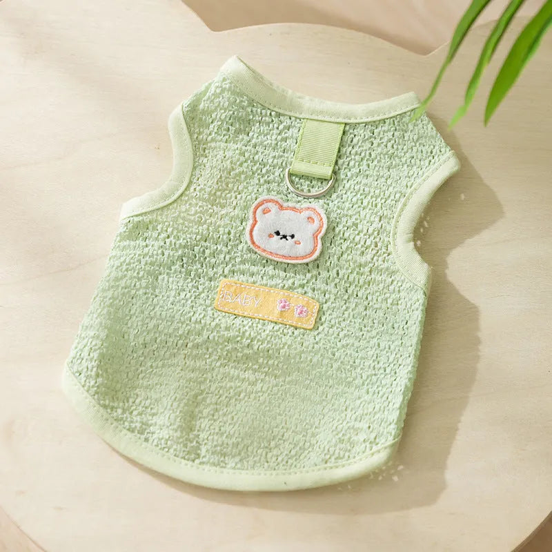 Green bear patch cat clothing with hollowed-out knitted fabric design on a feline