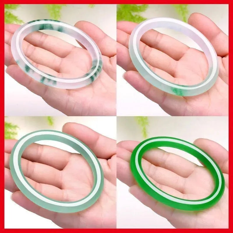 Jade bracelet with floating flower design and auspicious cloud patterns in ice-like emerald finish