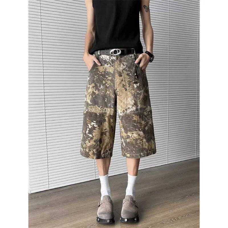 Yellow snake pattern camouflage cotton denim jeans with cropped length and distressed detailing