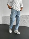Men's blue straight-leg denim jeans with mid-waist design and loose wide-leg silhouette