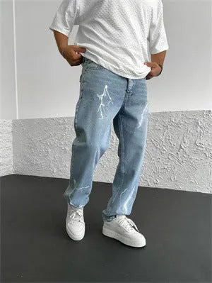 Men's blue straight-leg denim jeans with mid-waist design and loose wide-leg silhouette