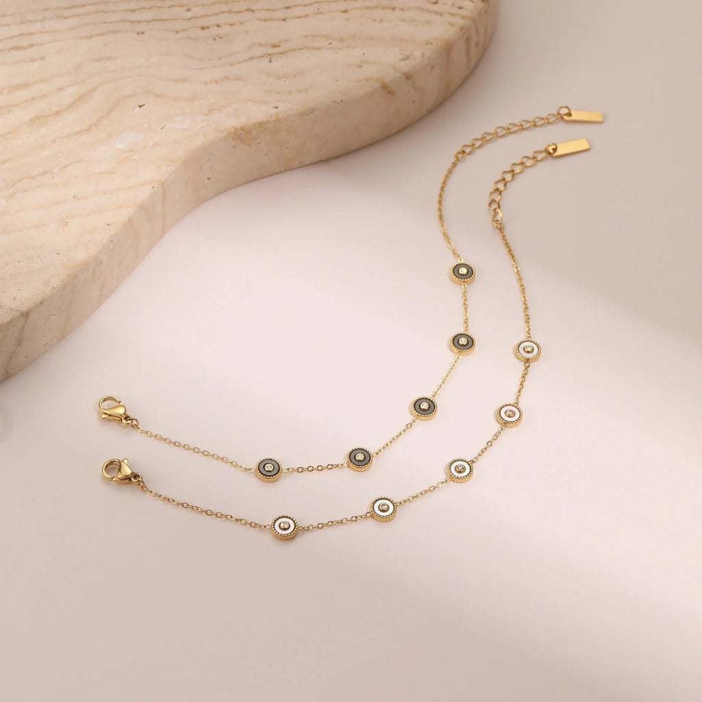 Women's stainless steel bracelet with 18K gold plating and geometric design