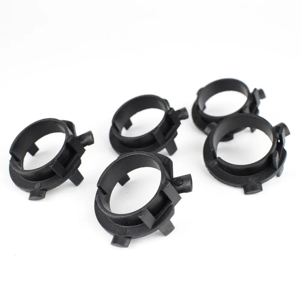 Black ABS plastic car headlight card holder for Nissan and Kia models showing compact size