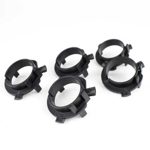 Black ABS plastic car headlight card holder for Nissan and Kia models showing compact size