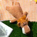 Interactive plush dog chew toy with corn kernel texture and squeaker in grey colour.
