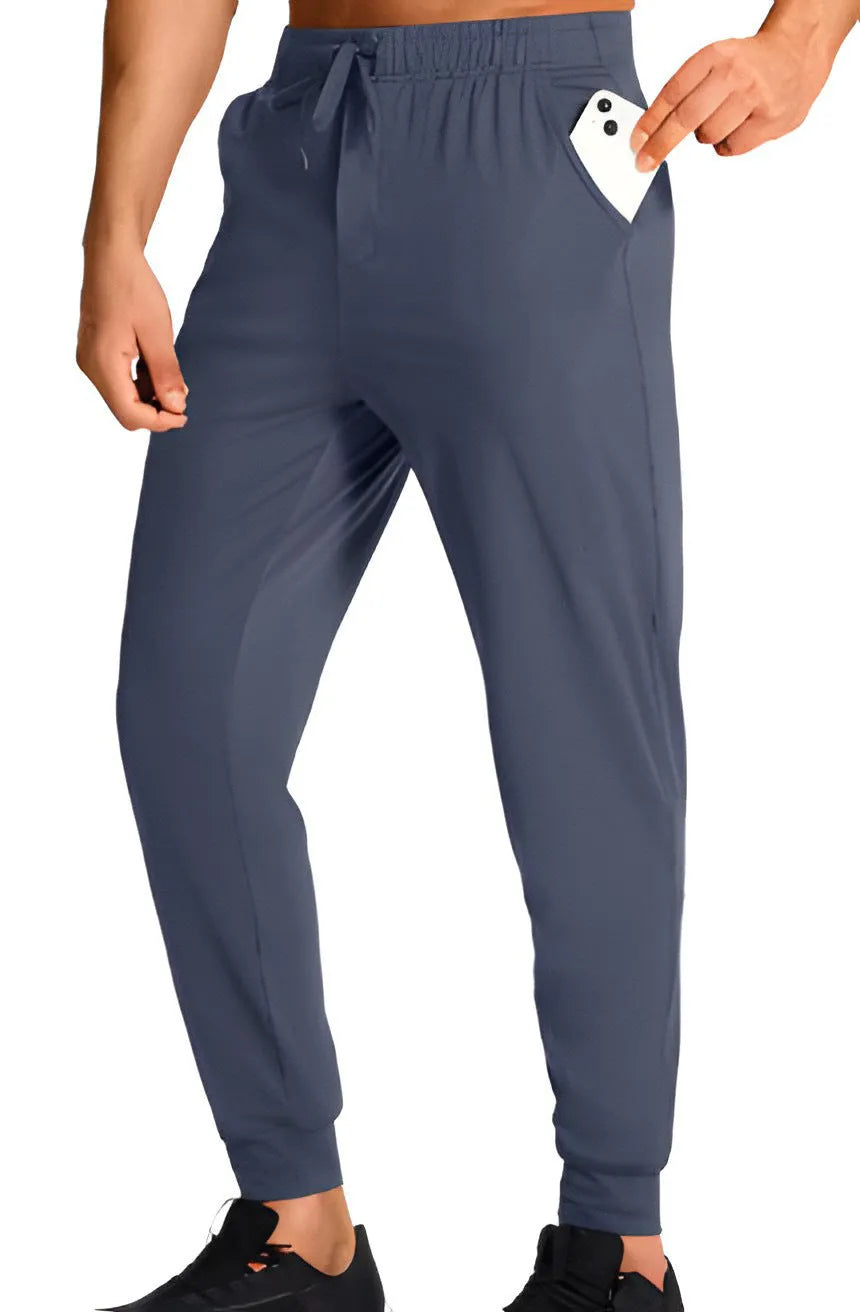 Men's loose fit casual trousers in solid colours with polyester fabric construction