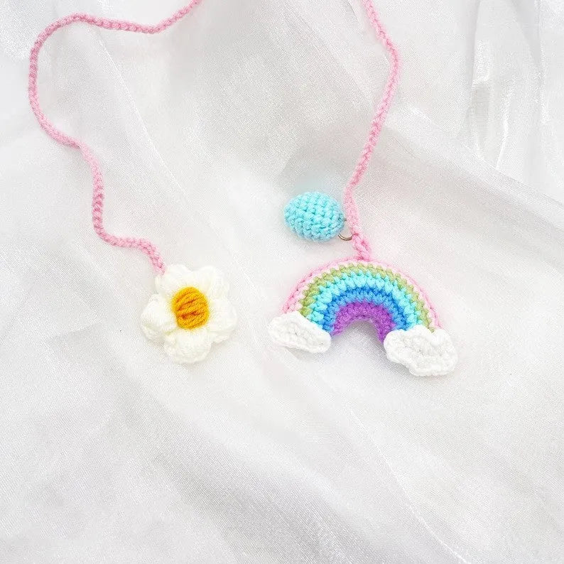 Handmade crocheted avocado rainbow flower car pendant in wool with cartoon styling