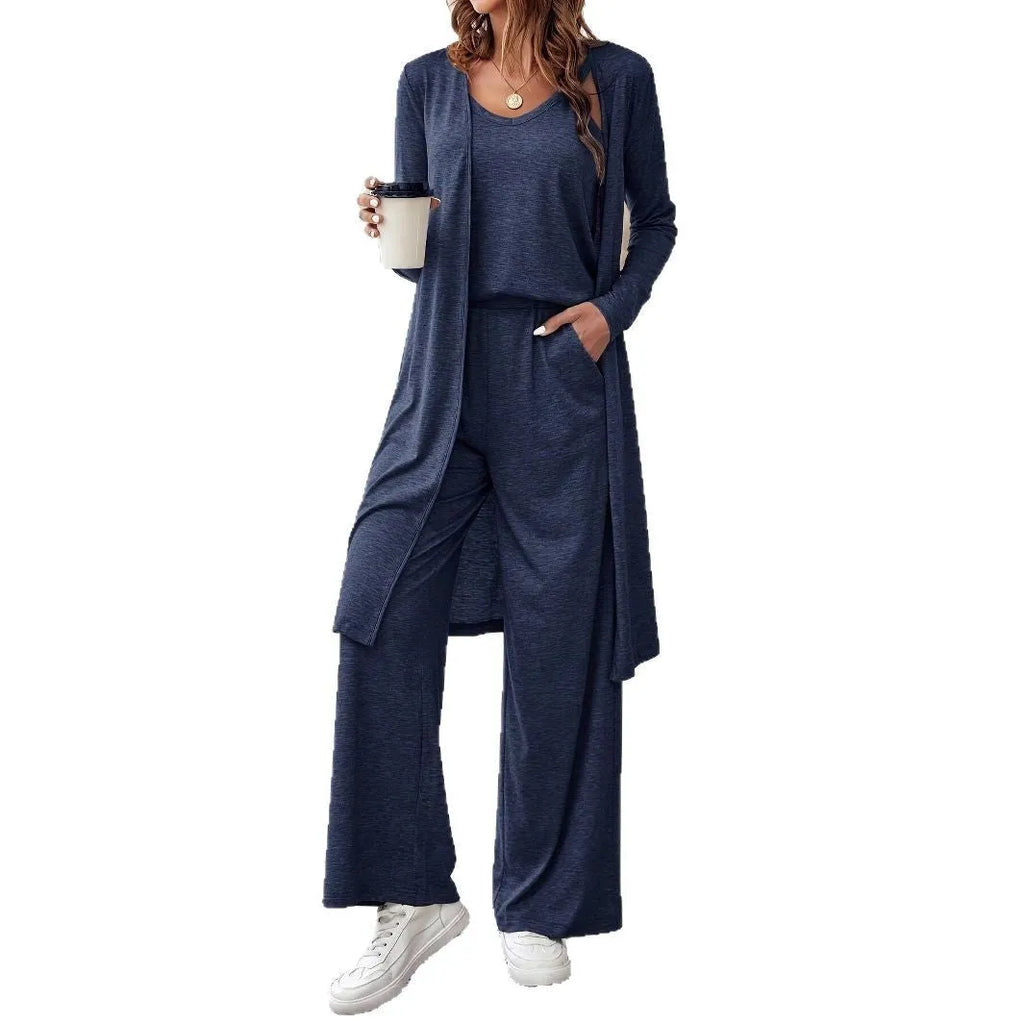 Blue women's casual two-piece set with sling top, cardigan trousers, and suspenders on a hanger.