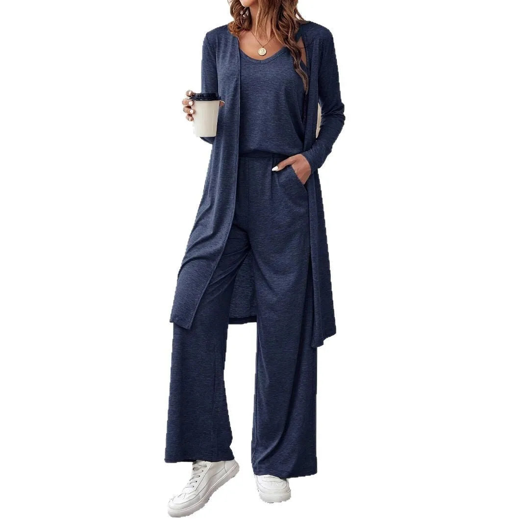 Blue women's casual two-piece set with sling top, cardigan trousers, and suspenders on a hanger.
