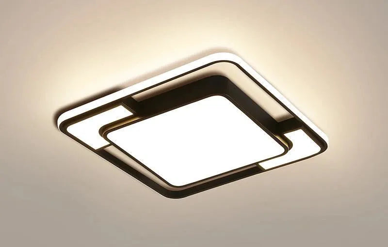 White square LED ceiling lamp with a PVC shade and iron frame, dimensions 42cm by 42cm.