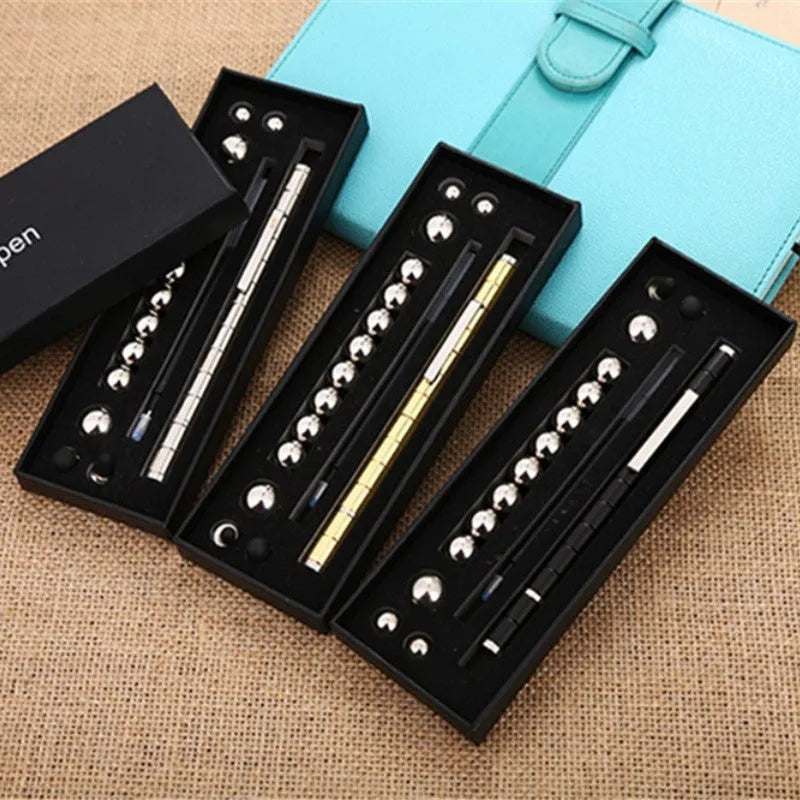Magnetic polar pen with modular rings, steel balls, and capacitive tip in silver iron box packaging
