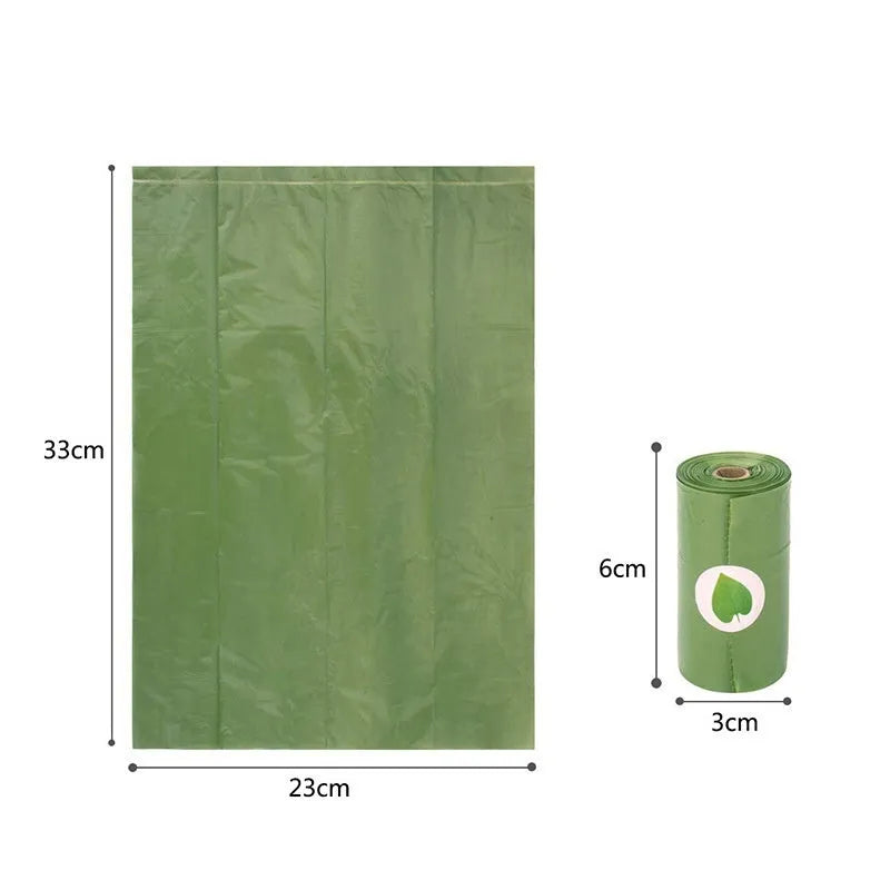 Rolls of green, black, blue, purple and orange degradable pet poo bags with a portable dispenser