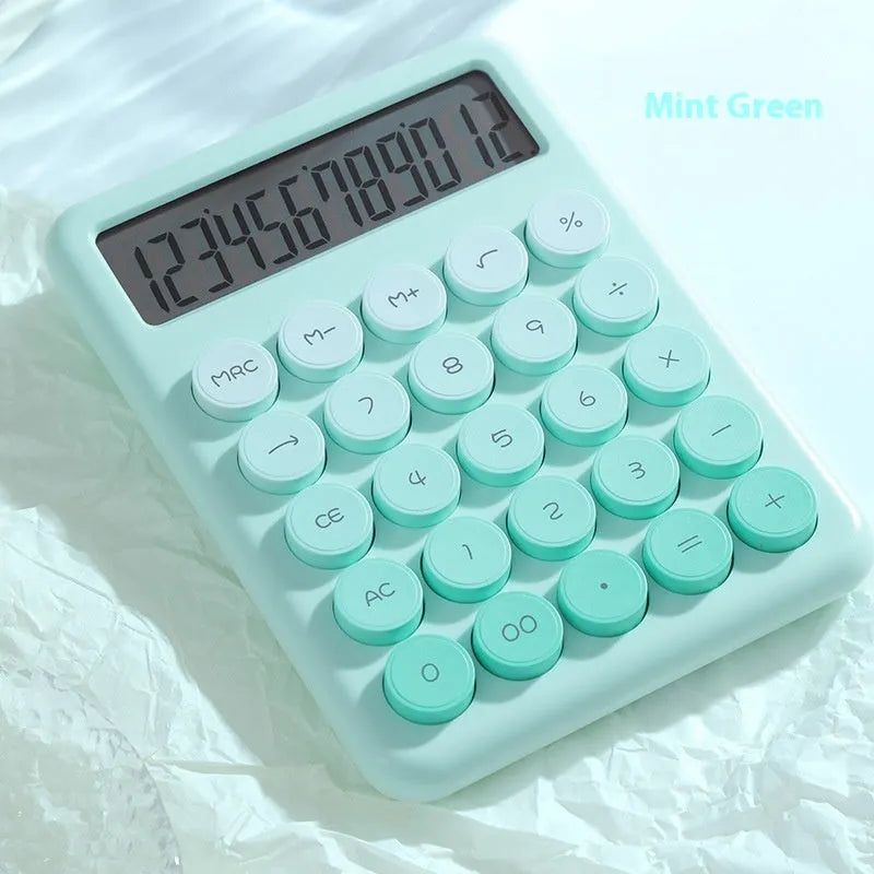 Gradient colour desk calculator showing violet, cherry blossom, blue and green shade options