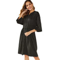 Women's black polyester dress with elastic waist, self-tie belt, and elastic cuffs on long sleeves
