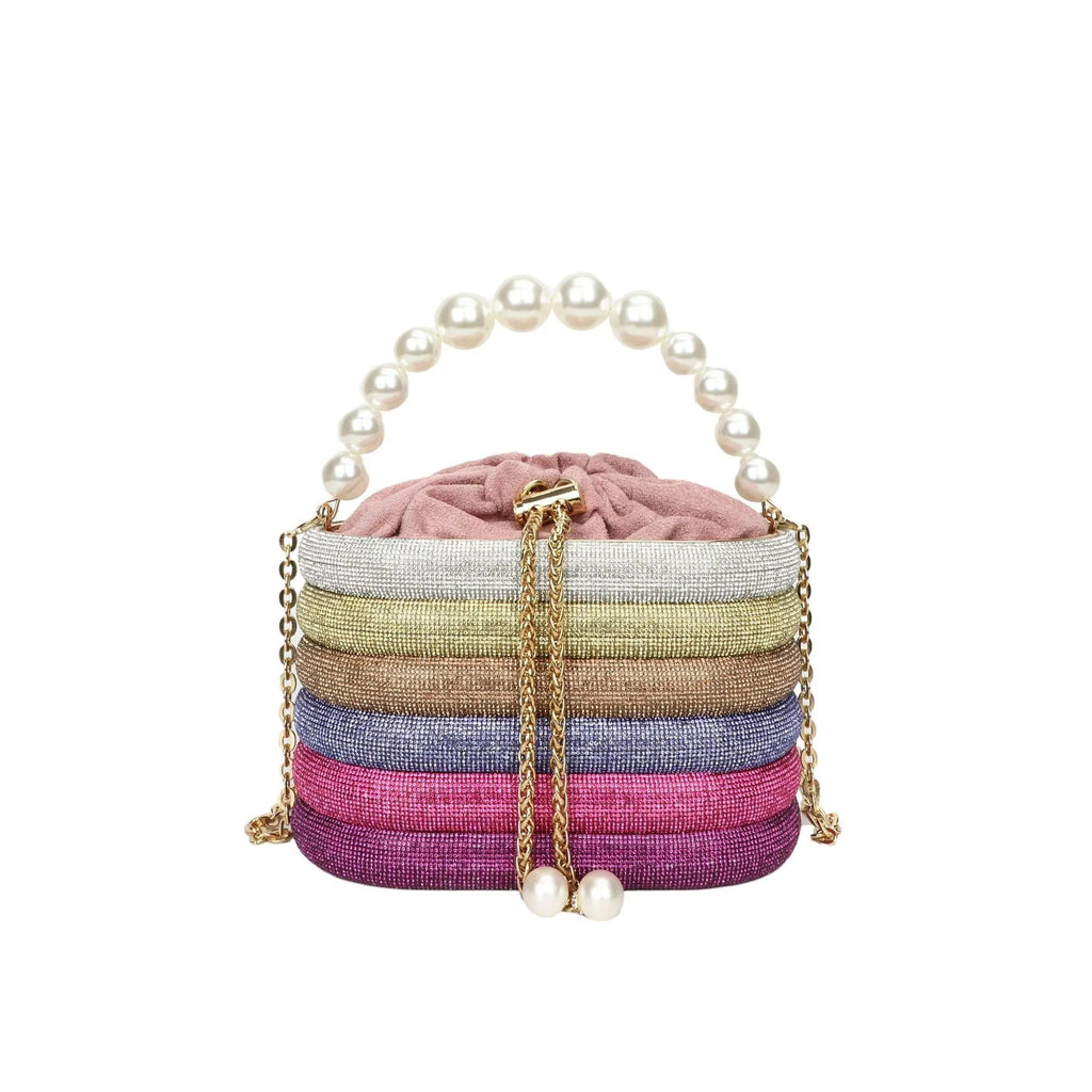 Women's retro style crossbody bag with pearl beads and rounded shape in soft PU material