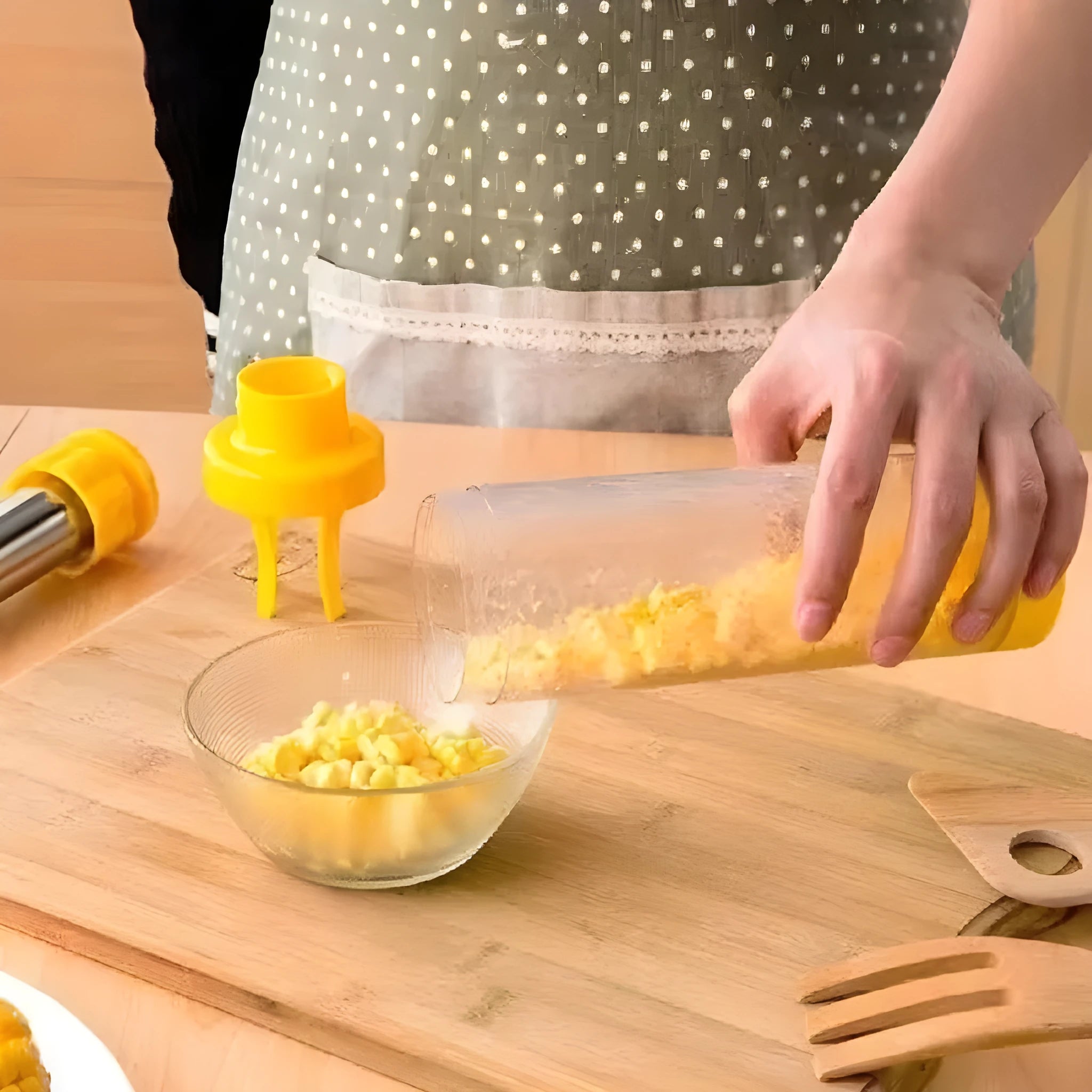 Yellow cylindrical corn stripper tool with ABS plastic and stainless steel construction