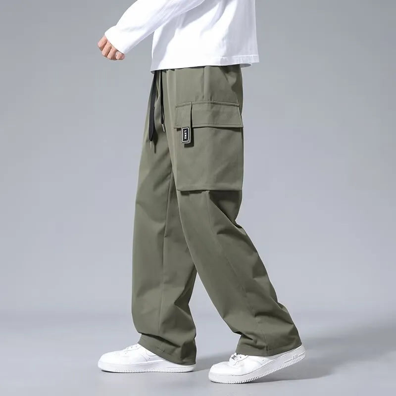 Boys' straight leg cargo trousers with drawstring waist and large pockets in polyester fabric
