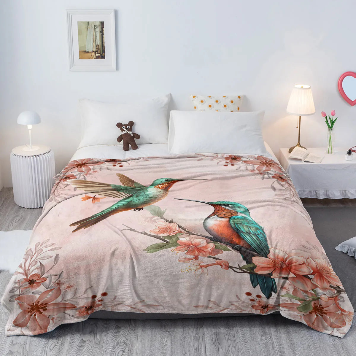 Pink hummingbird floral flannel velvet fleece throw blanket on sofa