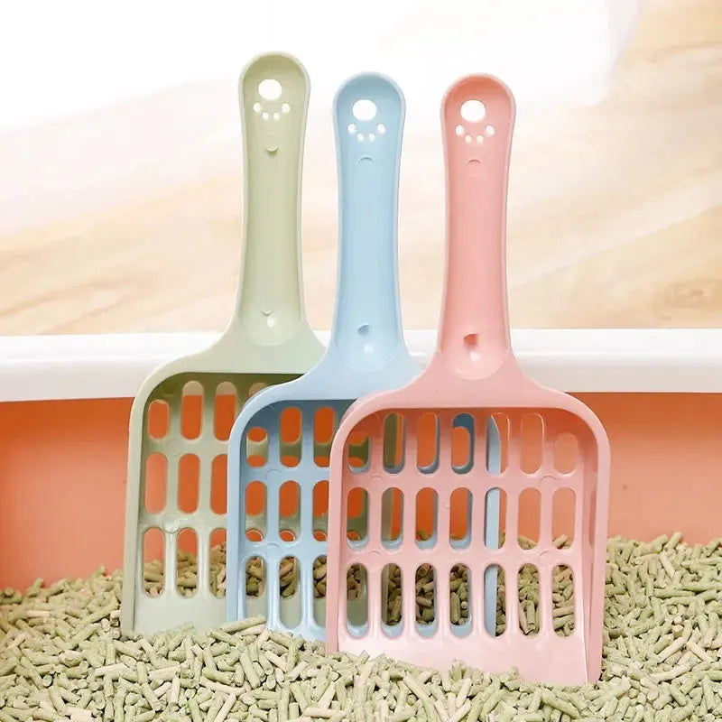 Blue plastic cat litter scoop showing 20cm length and built-in sand shovel.