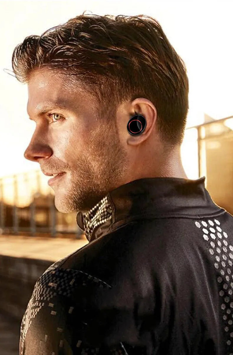X11 black Bluetooth wireless earbuds with charging case showing touch controls and silicone ear sleeves
