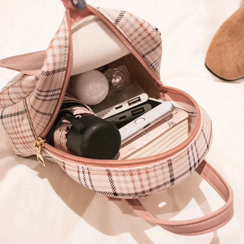PU leather one shoulder diagonal phone bag in multiple colours showing crossbody wear