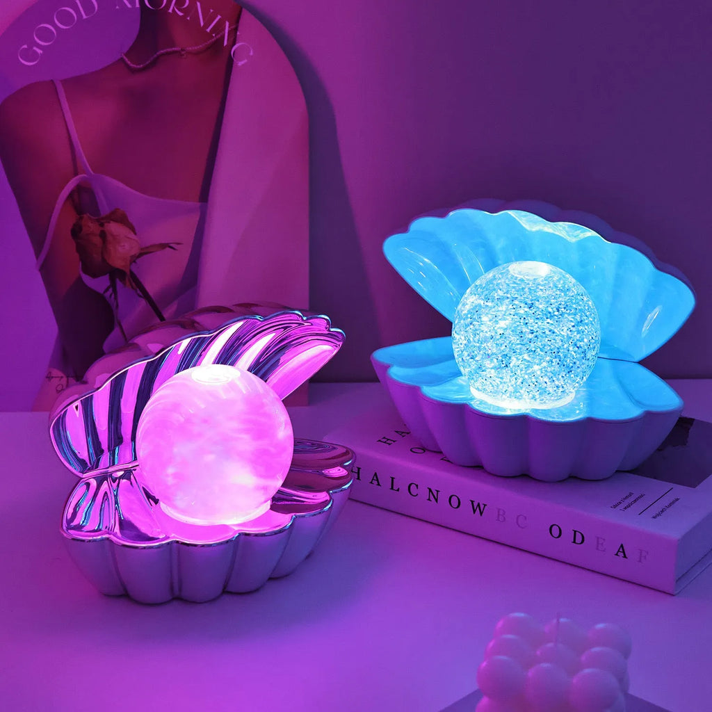 Shell-shaped decorative night lamp with neon ambience lighting in three colour variations