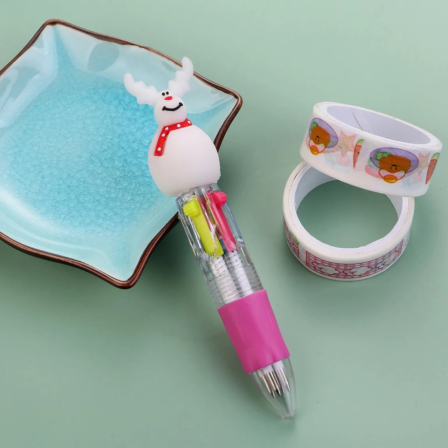 Compact 11cm Christmas four-colour ballpoint pen with press mechanism in festive designs