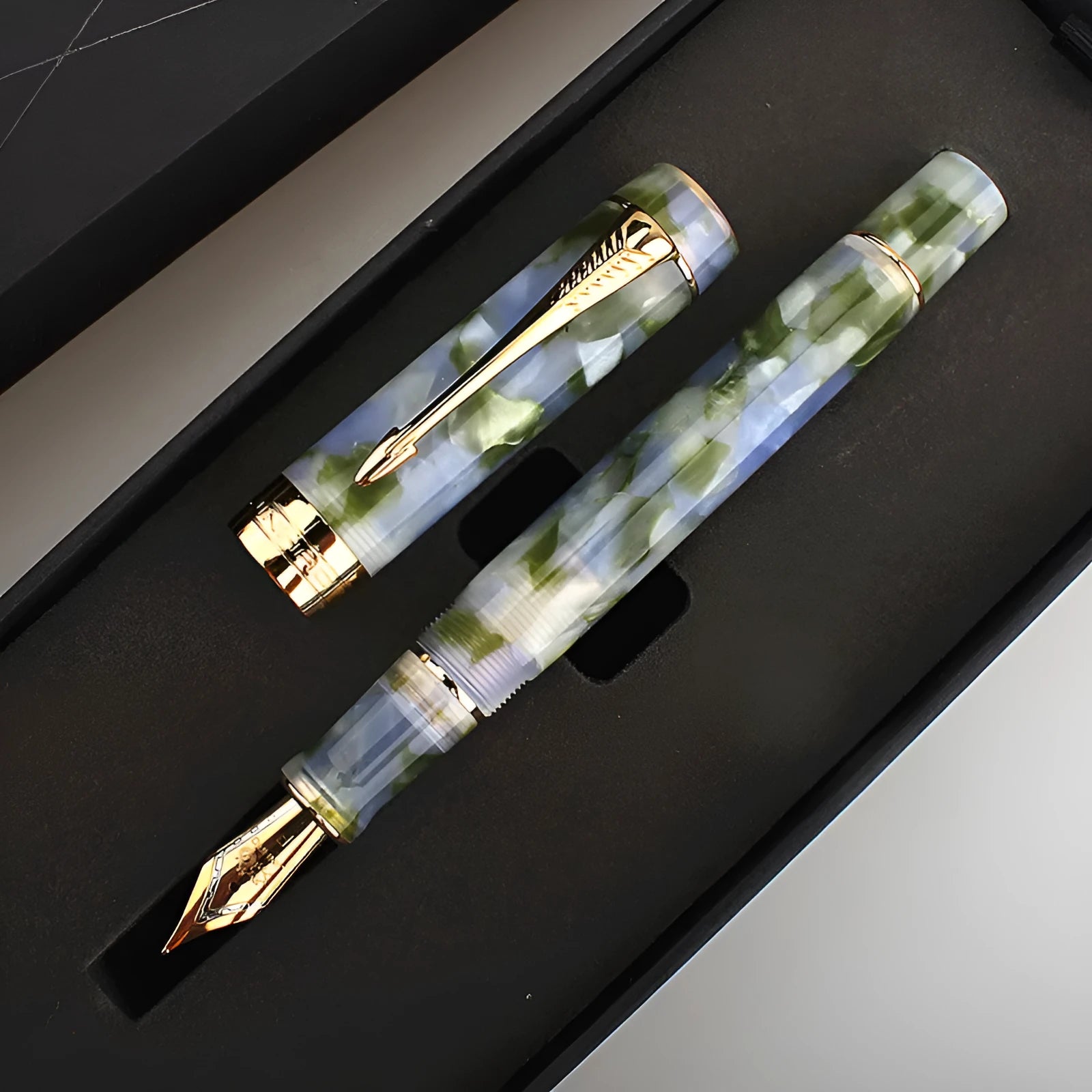 Deep bath green metal pen showing fine, medium and graphic tip options