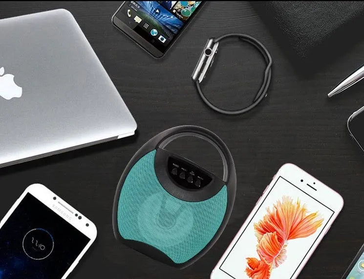 Portable Bluetooth speaker in black, blue, or pink colour with USB and SD card slots